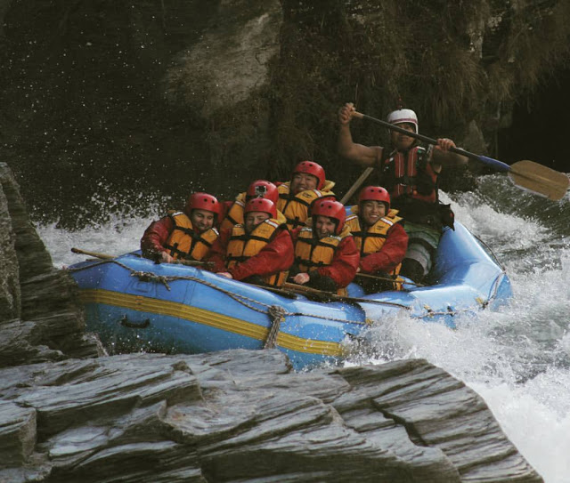 group-of-people-in-boat-on-Shotover-River-Queenstown-New Zealand