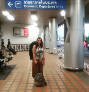 young-woman-with-backpack-outside-chiang-mai-airport